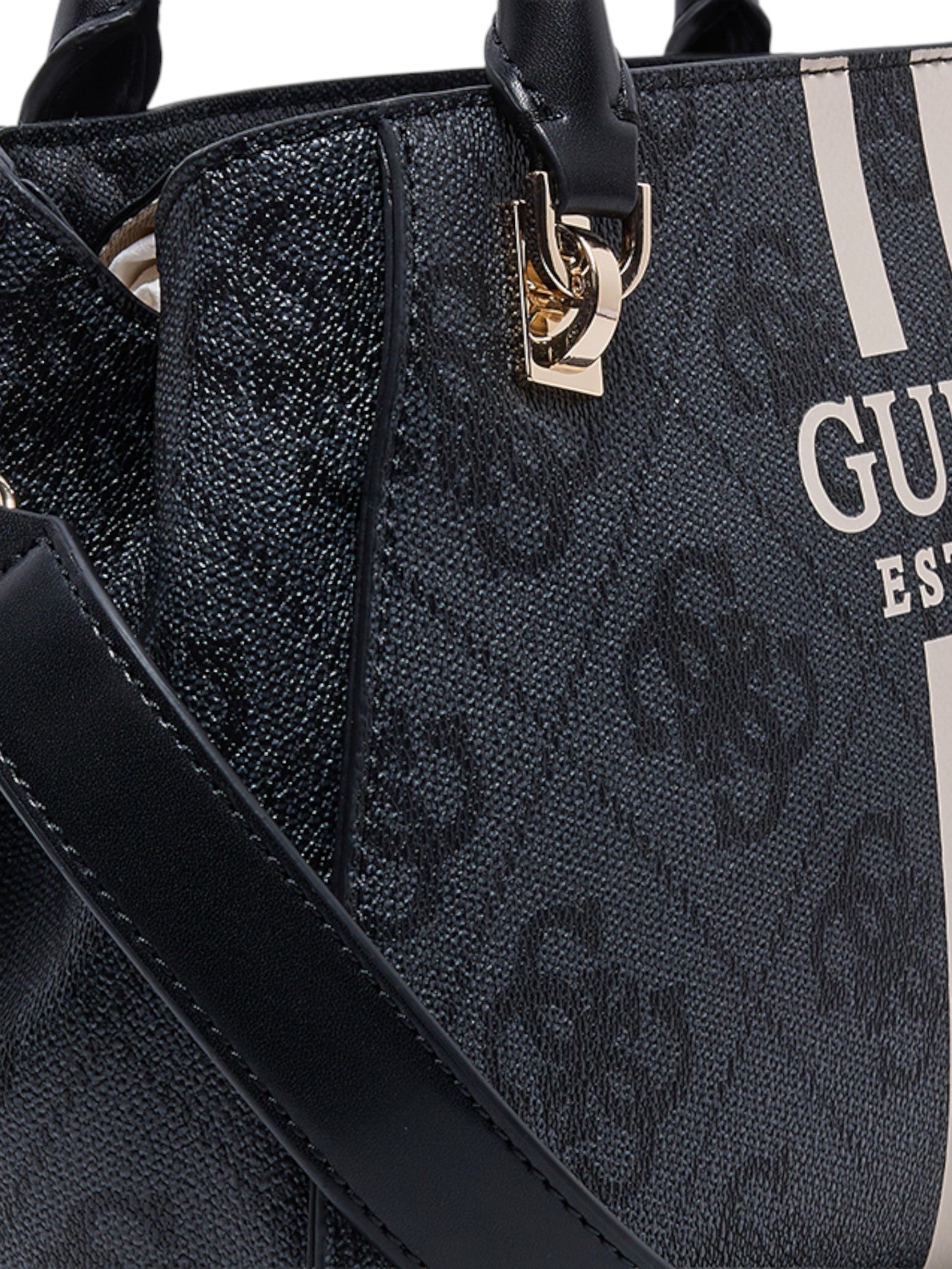 Black handbag with gold clasp and visible brand logo on a dark background. Guess, Monza Outlet, Monza Fashion, Shein Outlet