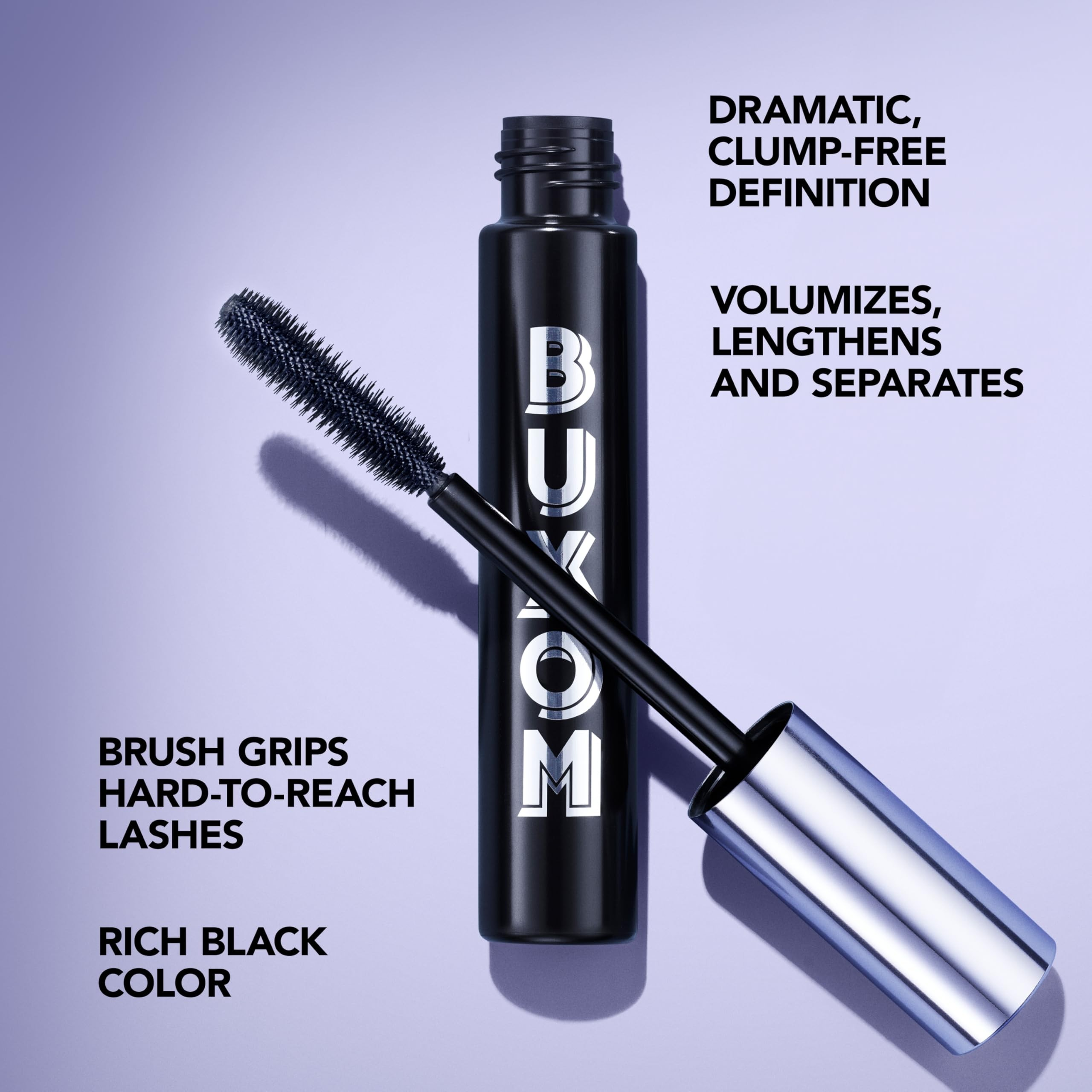 Buxom mascara with brush on a purple background Monza Outlet