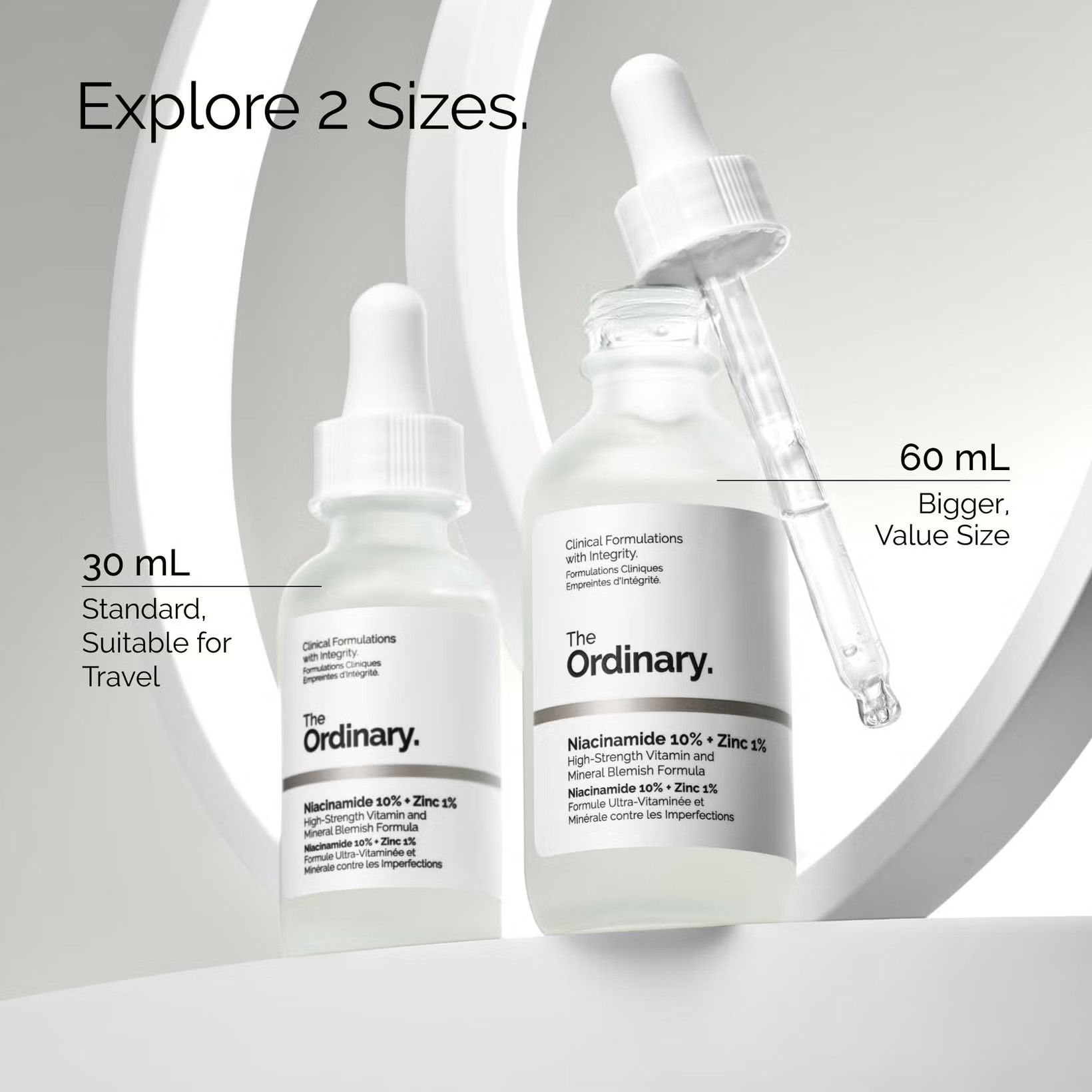 Two skincare serum bottles from The Ordinary with droppers, labeled 30 mL and 60 mL. Monza Outlet