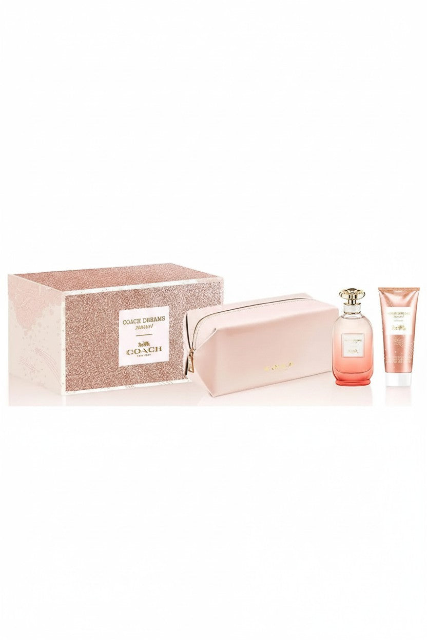 Guerlain Paris perfume gift set featuring a glittery rose gold box, a light pink zippered pouch, a pink glass perfume bottle, and a matching pink tube, displayed on a clean white background. Guerlain, Monza Outlet, Monza Fashion, Shein Outlet