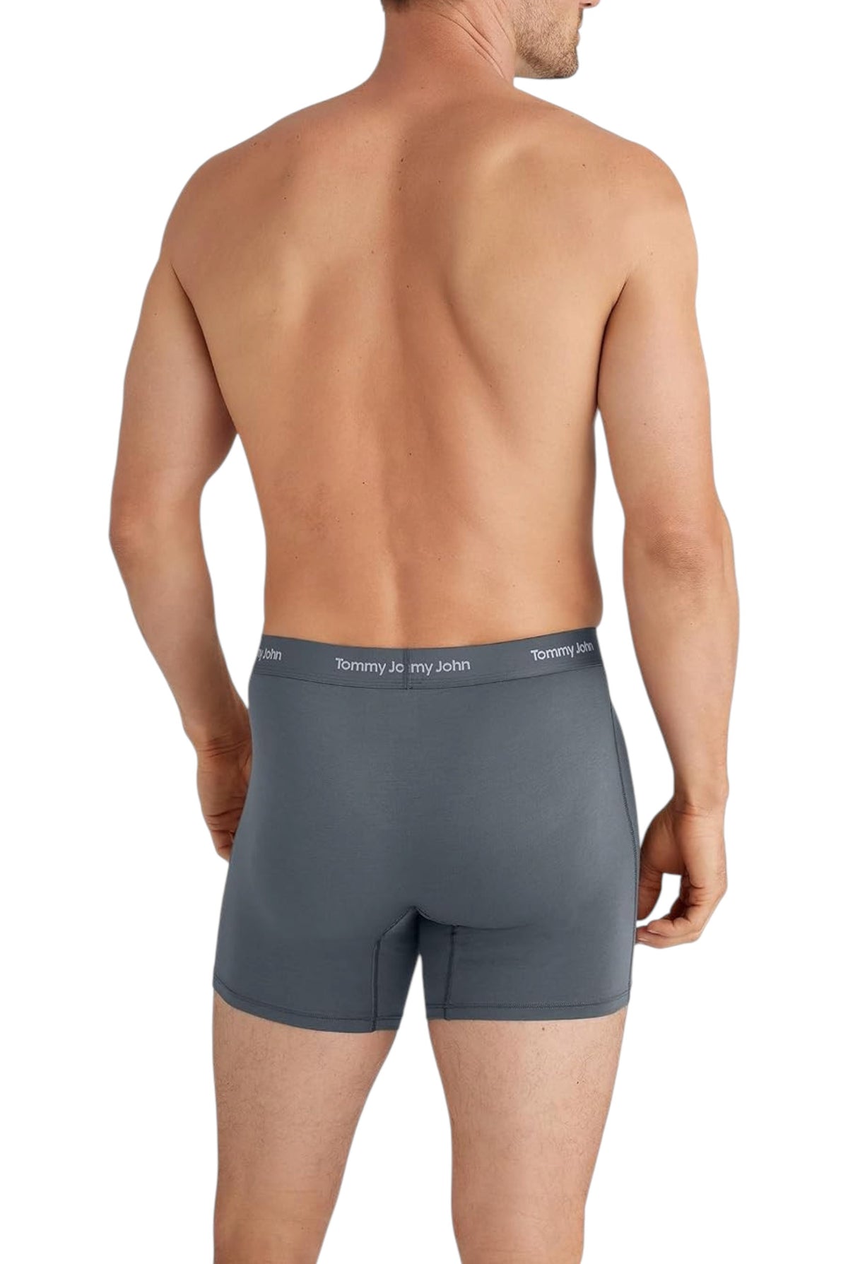 A male model wearing Tommy John boxer briefs, standing in a natural pose against a clean white background, with the underwear clearly visible. Tommy Hilfiger, Monza Outlet, Monza Fashion, Shein Outlet