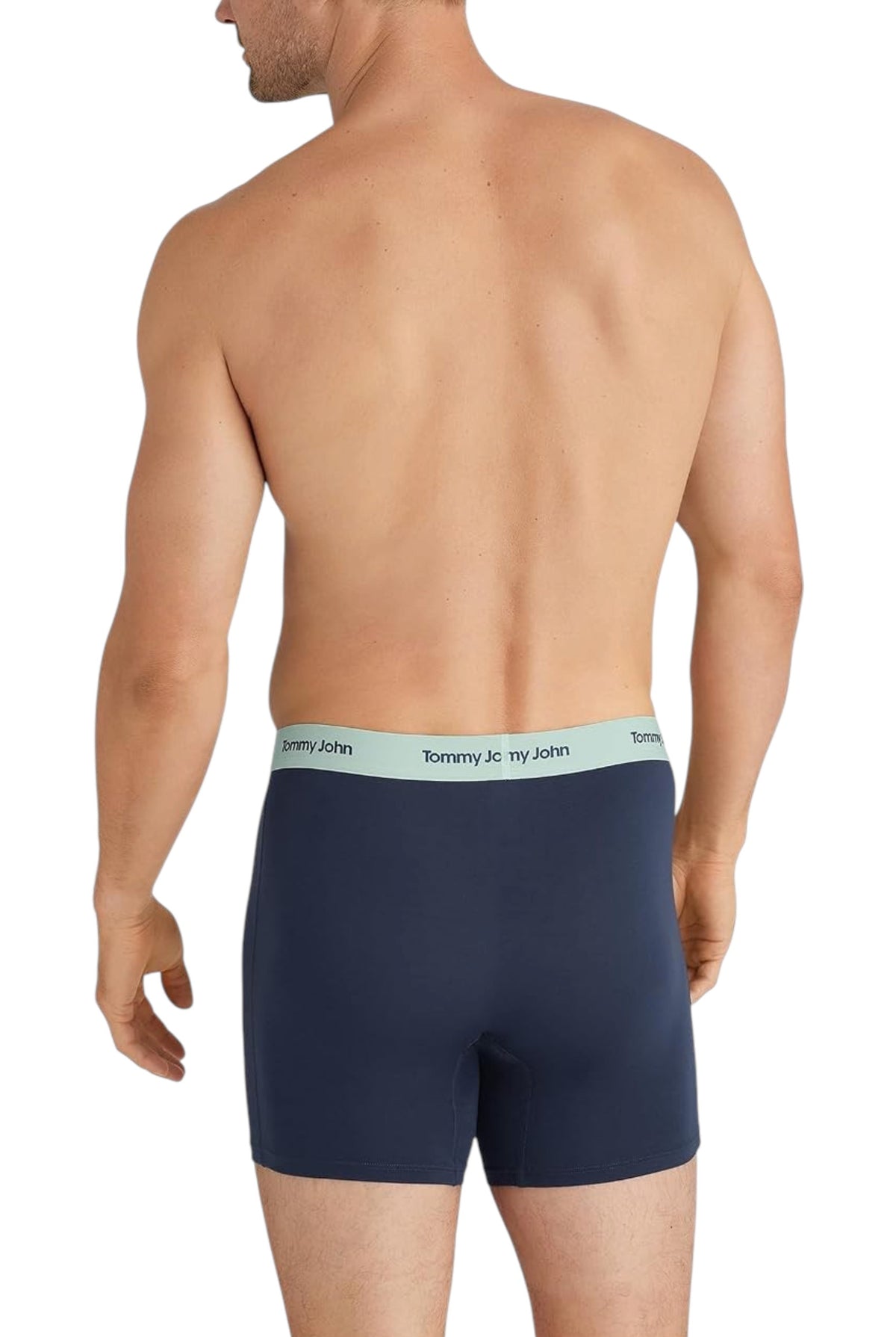 A male model wearing Tommy John boxer briefs, standing in a natural pose against a clean white background, with the underwear clearly visible. Tommy Hilfiger, Monza Outlet, Monza Fashion, Shein Outlet