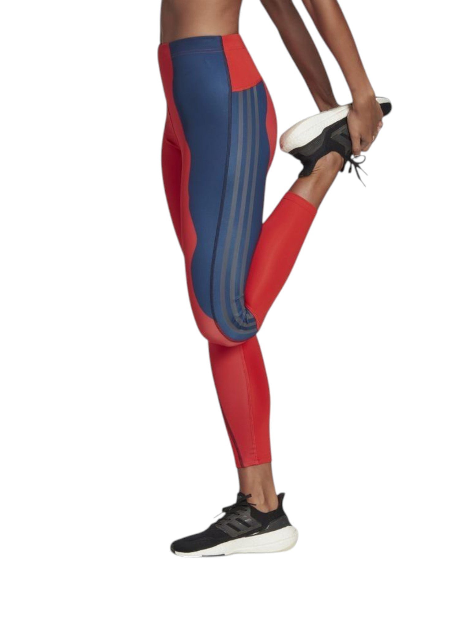 Red and blue leggings with stripes worn by a person on a white background. Adidas, Monza Outlet, Monza Fashion, Shein Outlet