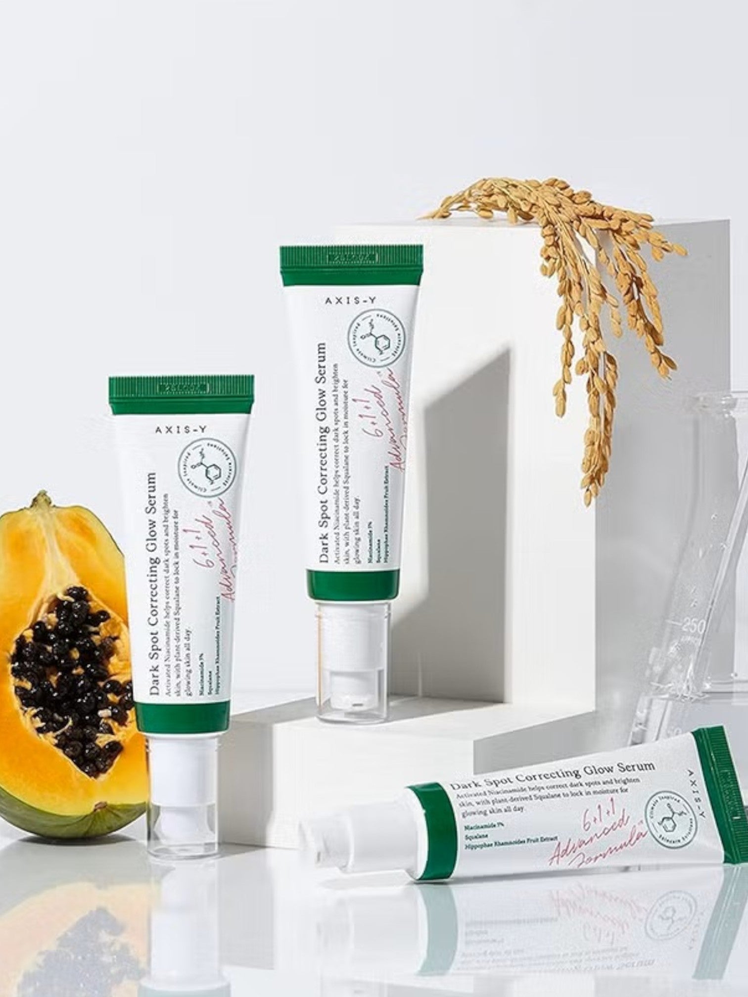 Three skincare tubes with green labels on a white background. Axis-y, Monza Outlet, Monza Fashion, Shein Outlet