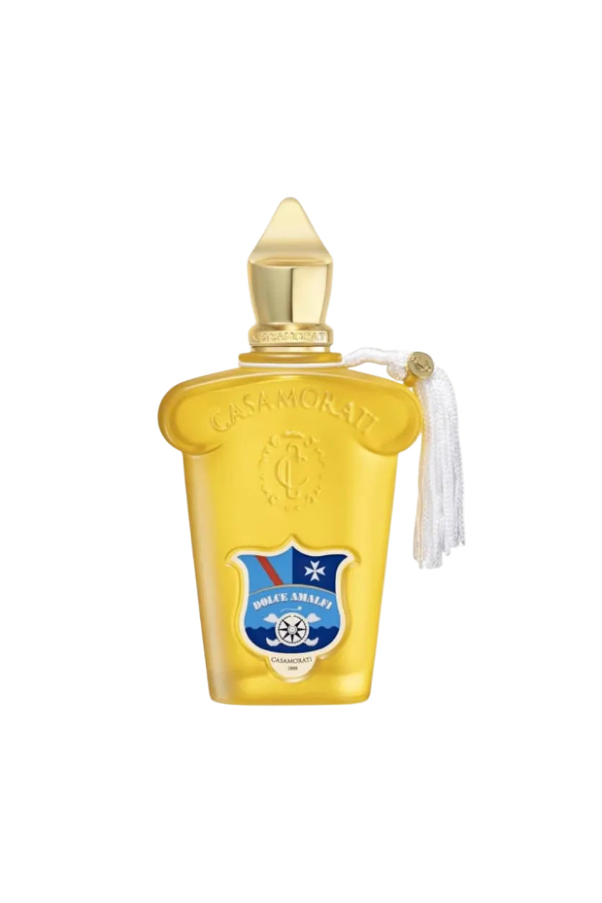 Yellow Casamorati perfume bottle with gold cap on a white background monza outlet, Shein outlet, monza fashion