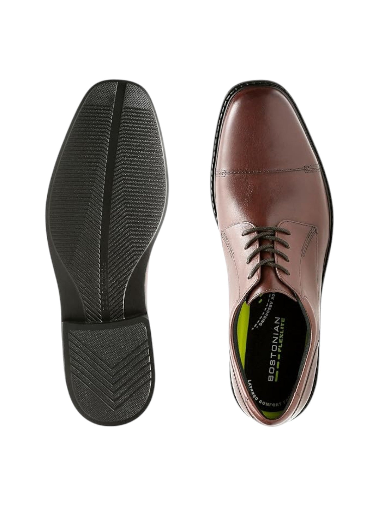 Brown dress shoe with sole showing texture on a white background. Clarks, Monza Outlet, Monza Fashion, Shein Outlet