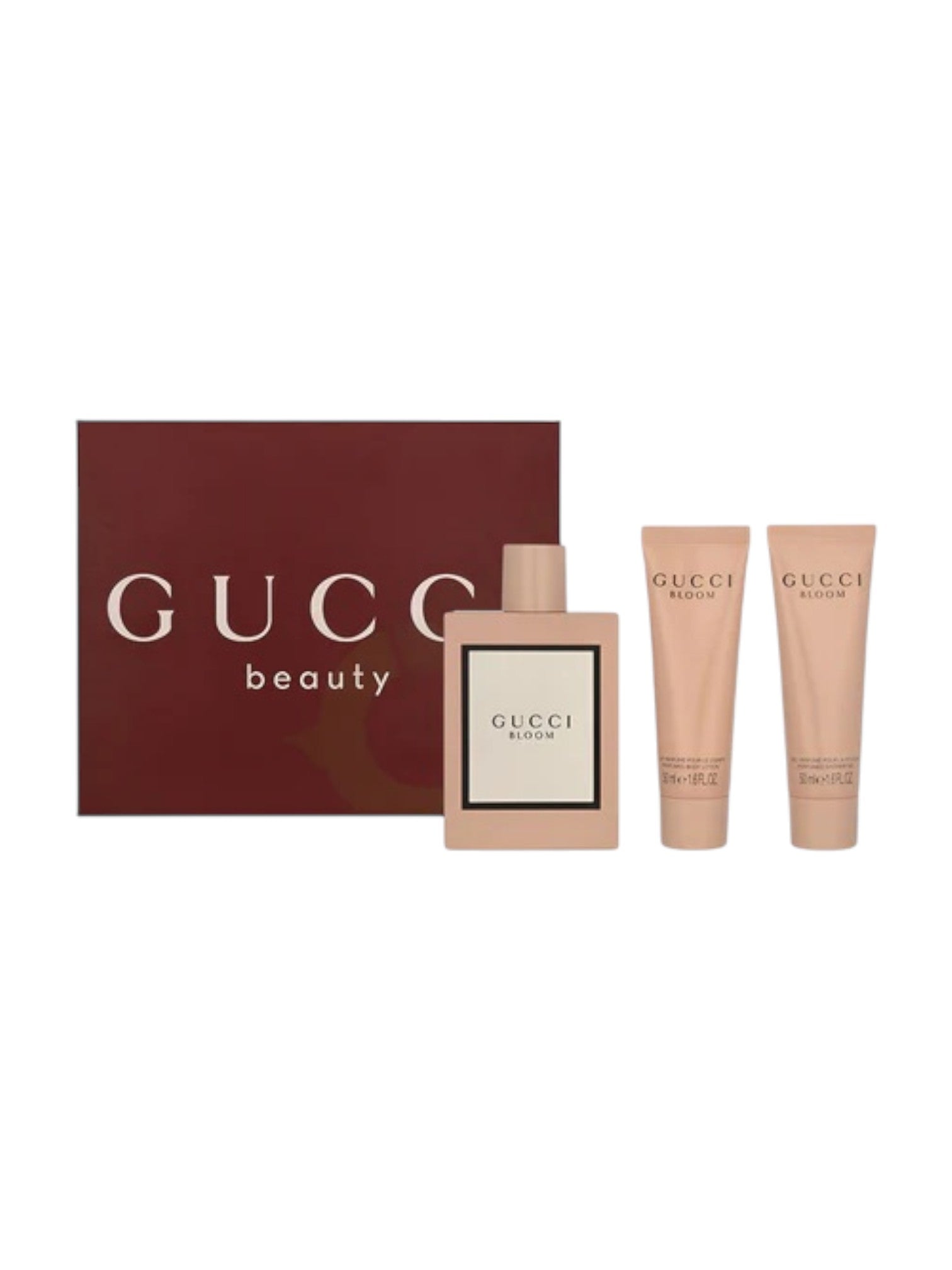 Gucci beauty product set including a perfume bottle and two cream tubes on a white background. monza outlet, Shein outlet, monza fashion