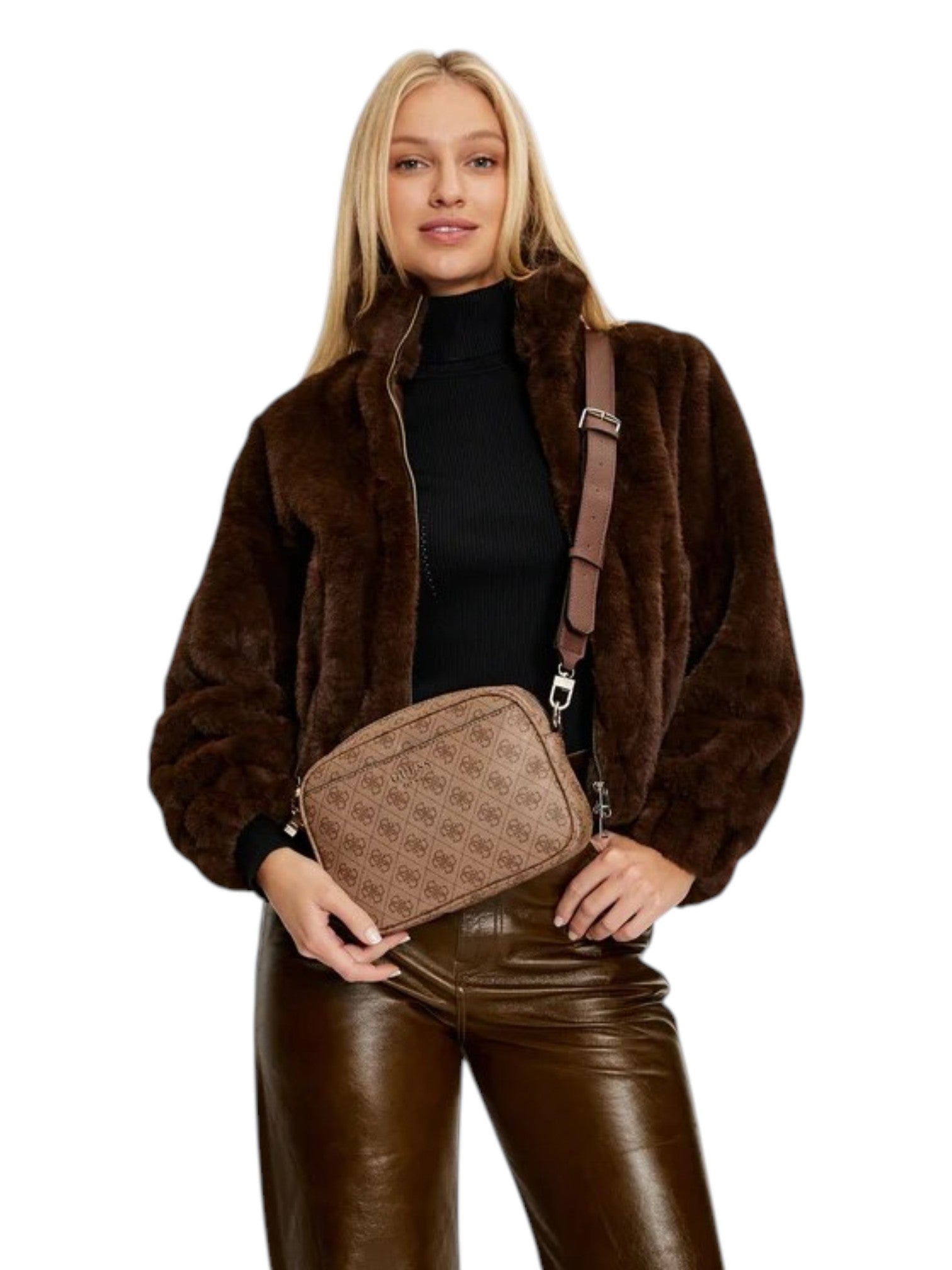 Woman holding a brown leather bag against a white background. Guess, Monza Outlet, Monza Fashion, Shein Outlet