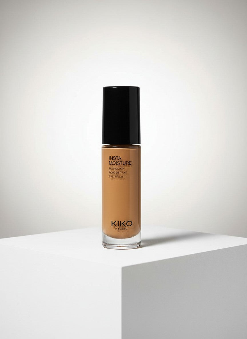 Kiko Milano foundation bottle on a light gray background. Kiko, Monza Outlet, Monza Fashion, Shein Outlet 