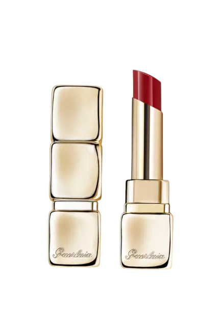 Red lipstick with gold casing on a white background, featuring the Guerlain brand. Monza Outlet