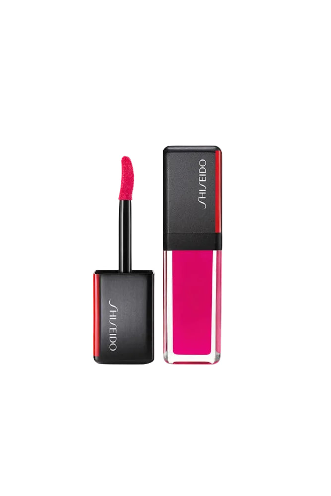 Shiseido lip gloss with applicator on a white background Monza Outlet