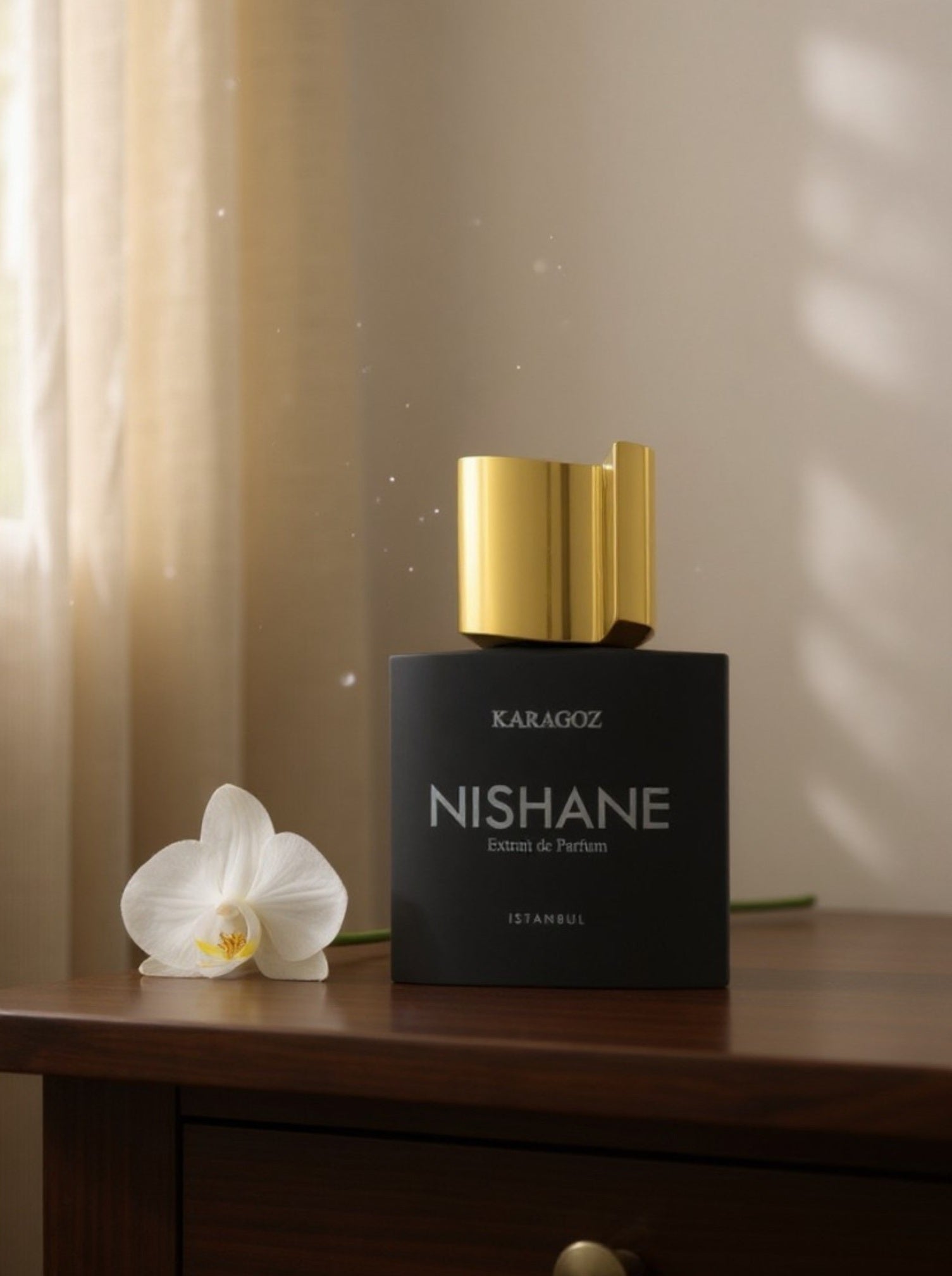 Nishane perfume bottle with gold cap on a wooden surface next to a white orchid. Nishane, Monza Outlet, Monza Fashion, Shein Outlet