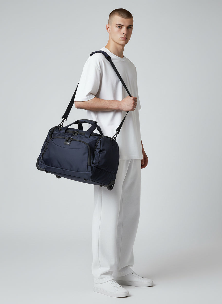 Man holding a navy duffel bag against a white background. Monza Italy, Monza Outlet, Monza Fashion, Shein Outlet 