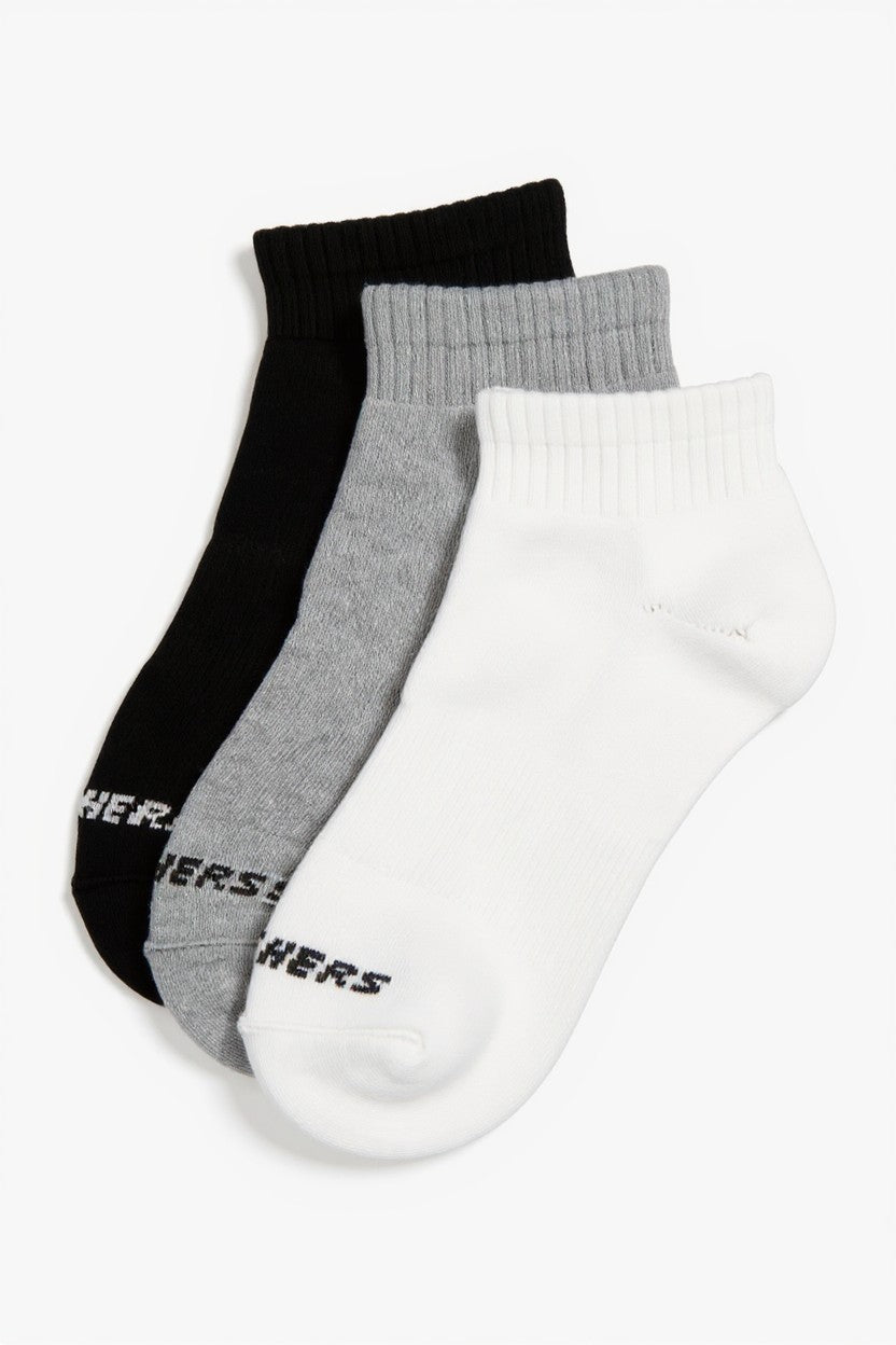 Three pairs of socks in black, gray, and white with 'Hers' branding on a white background. Skechers, Monza Outlet, Monza Fashion, Shein Outlet