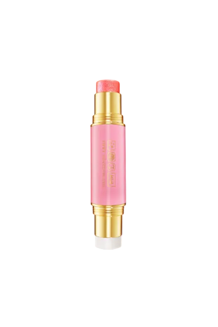 Pink and gold cosmetic stick on a white background. Pat McGrath Labs Monza Outlet