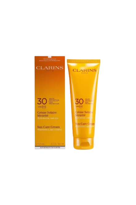 Clarins sun care cream packaging on a white background. Clarins, Monza Outlet, Monza Fashion, Shein Outlet