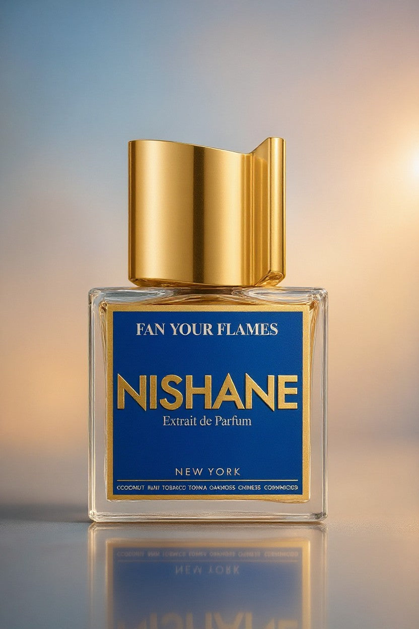 Nishane perfume bottle with gold cap on a reflective surface. Nishane, Monza Outlet, Monza Fashion, Shein Outlet