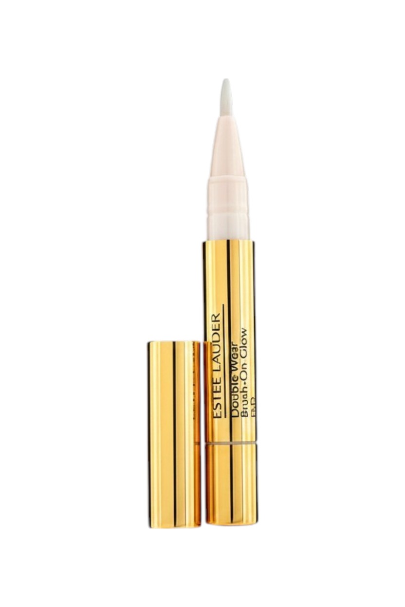 Estee Lauder makeup product with applicator on a white background. Estée Lauder, Monza Outlet, Monza Fashion, Shein Outlet