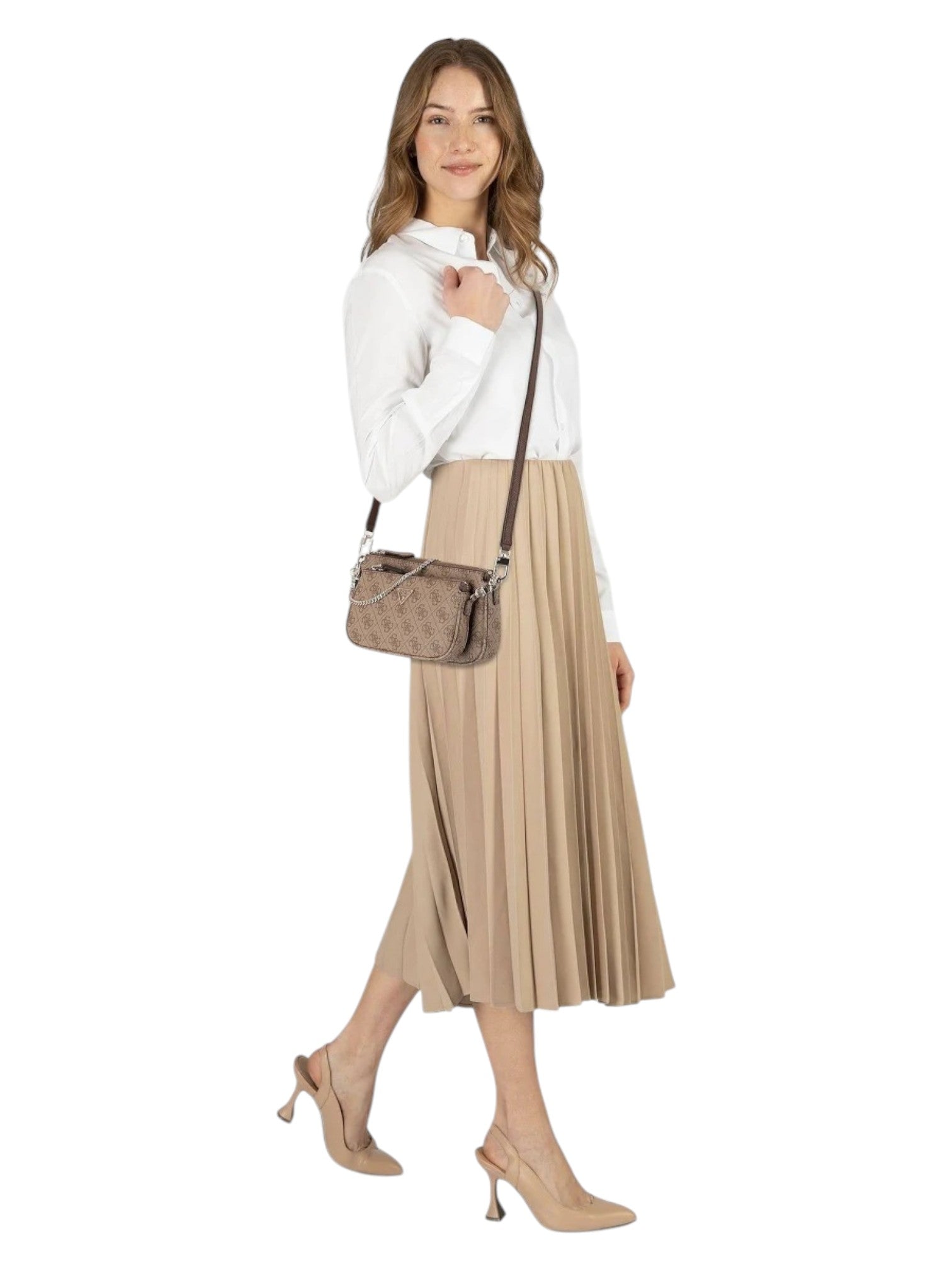 Woman wearing a white blouse and beige pleated skirt with a handbag on a white background. Guess, Monza Outlet, Monza Fashion, Shein Outlet
