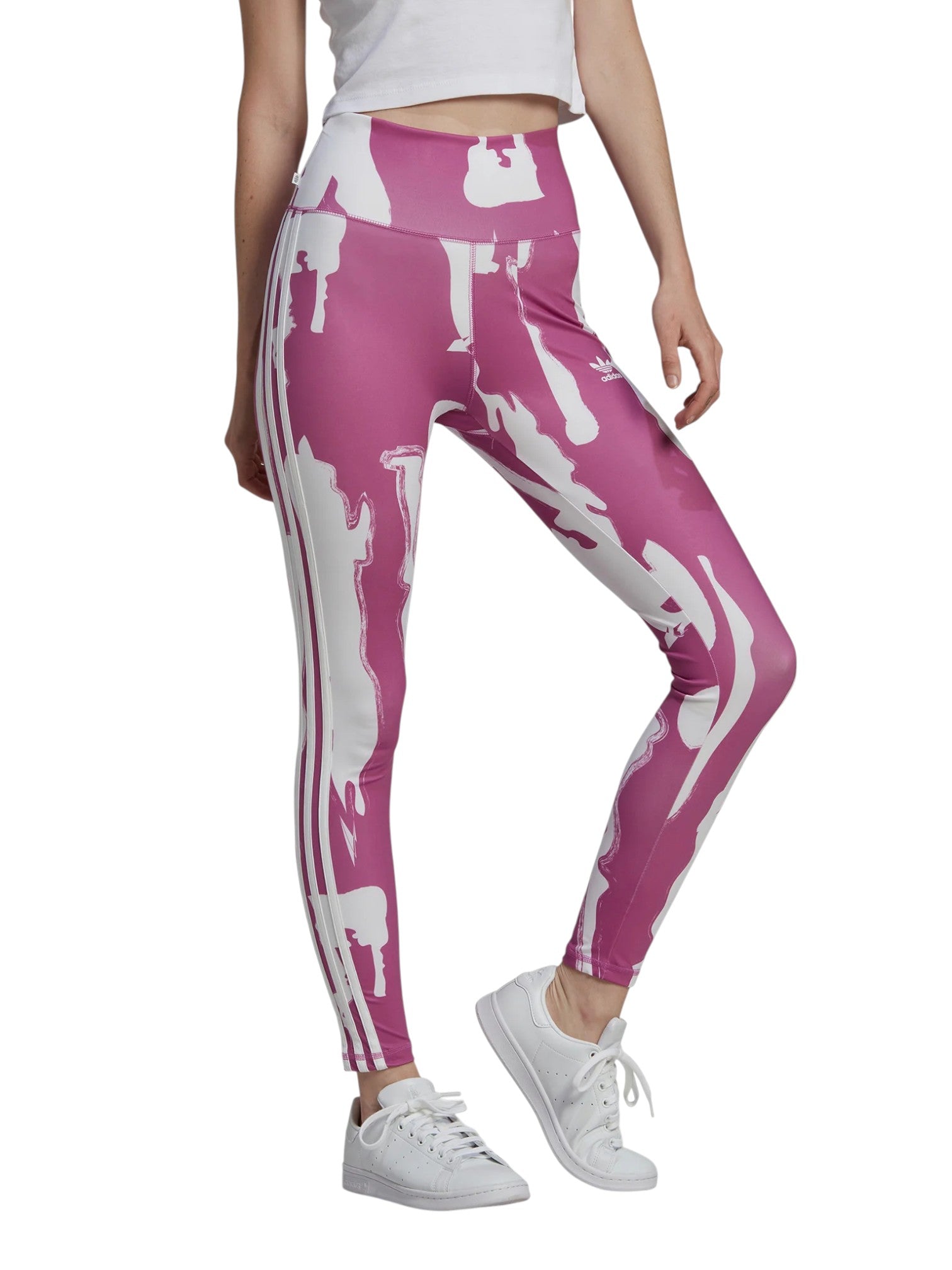 Pink leggings with white patterns worn by a person on a white background. Adidas, Monza Outlet, Monza Fashion, Shein Outlet