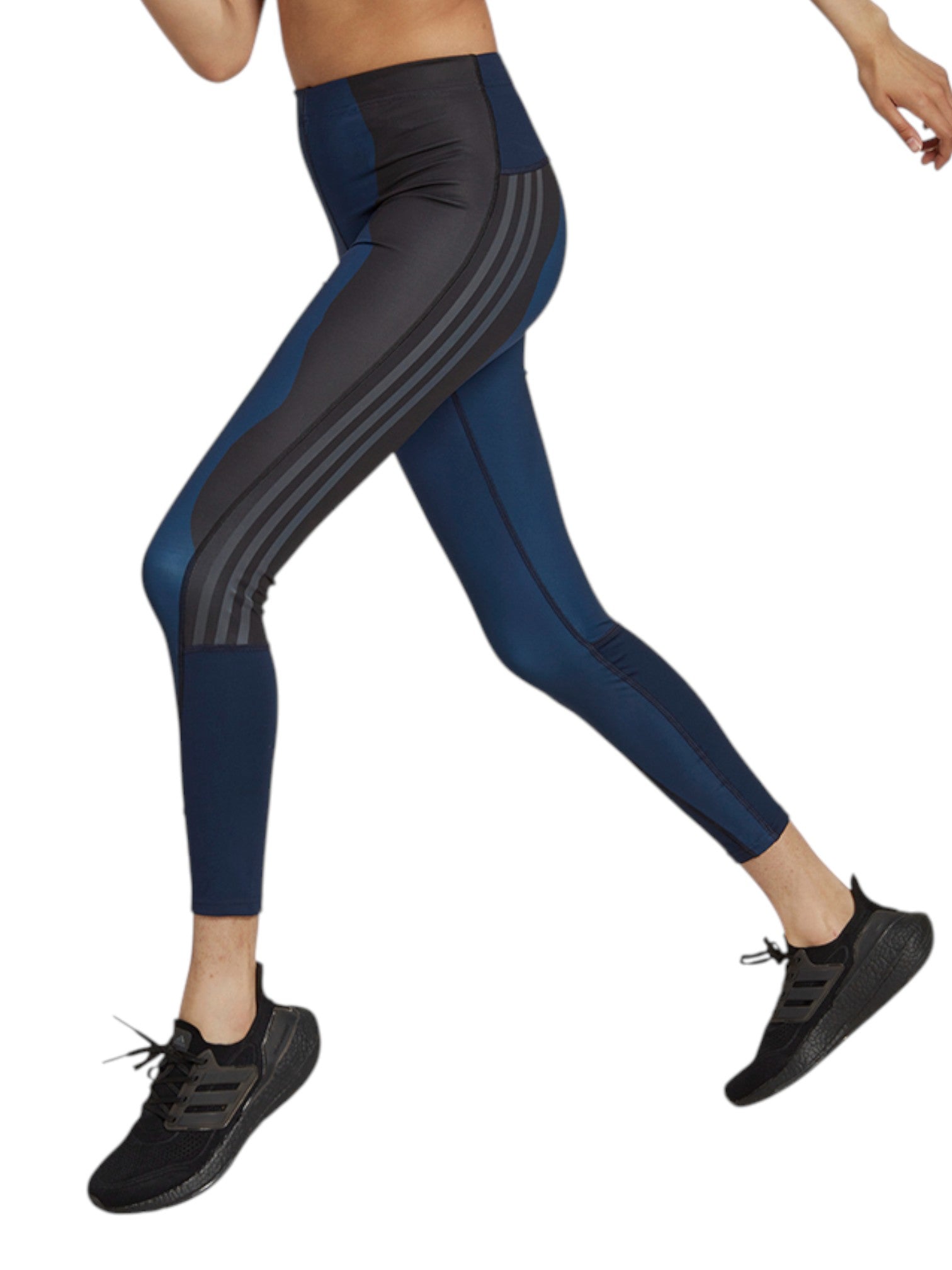 Navy and black leggings with stripes worn by a person on a white background. Adidas, Monza Outlet, Monza Fashion, Shein Outlet