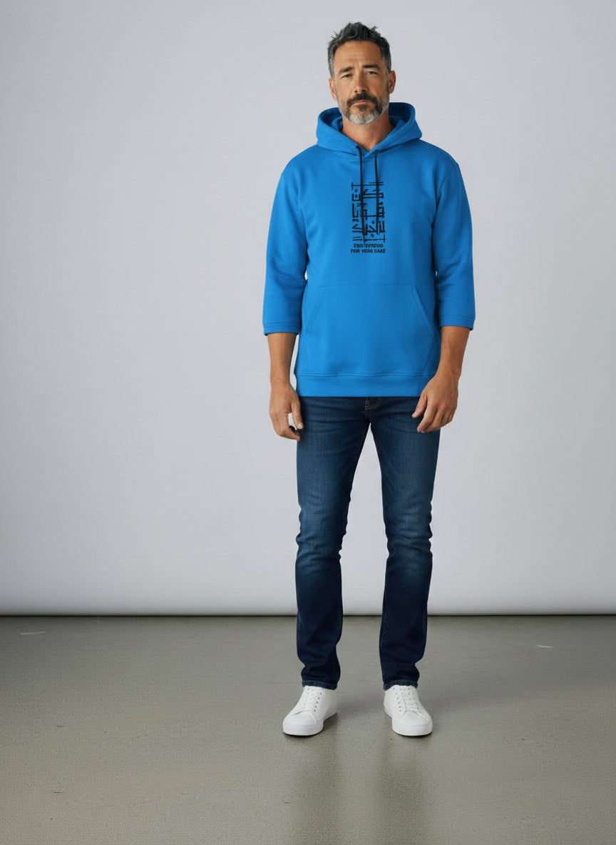 Man wearing a blue hoodie with a graphic design on a plain background. Antler, Monza Outlet, Monza Fashion, Shein Outlet  