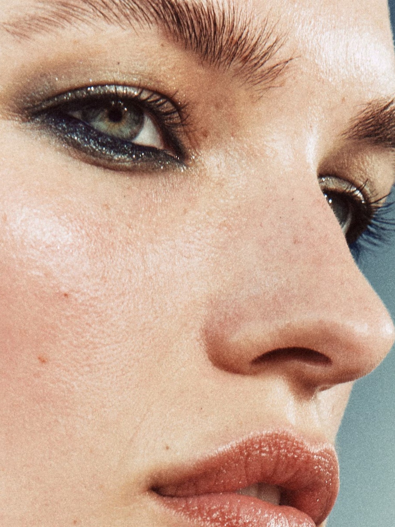 Close-up of a persons face with a neutral expression. Bobbi Brown, Monza Outlet, Monza Fashion, Shein Outlet