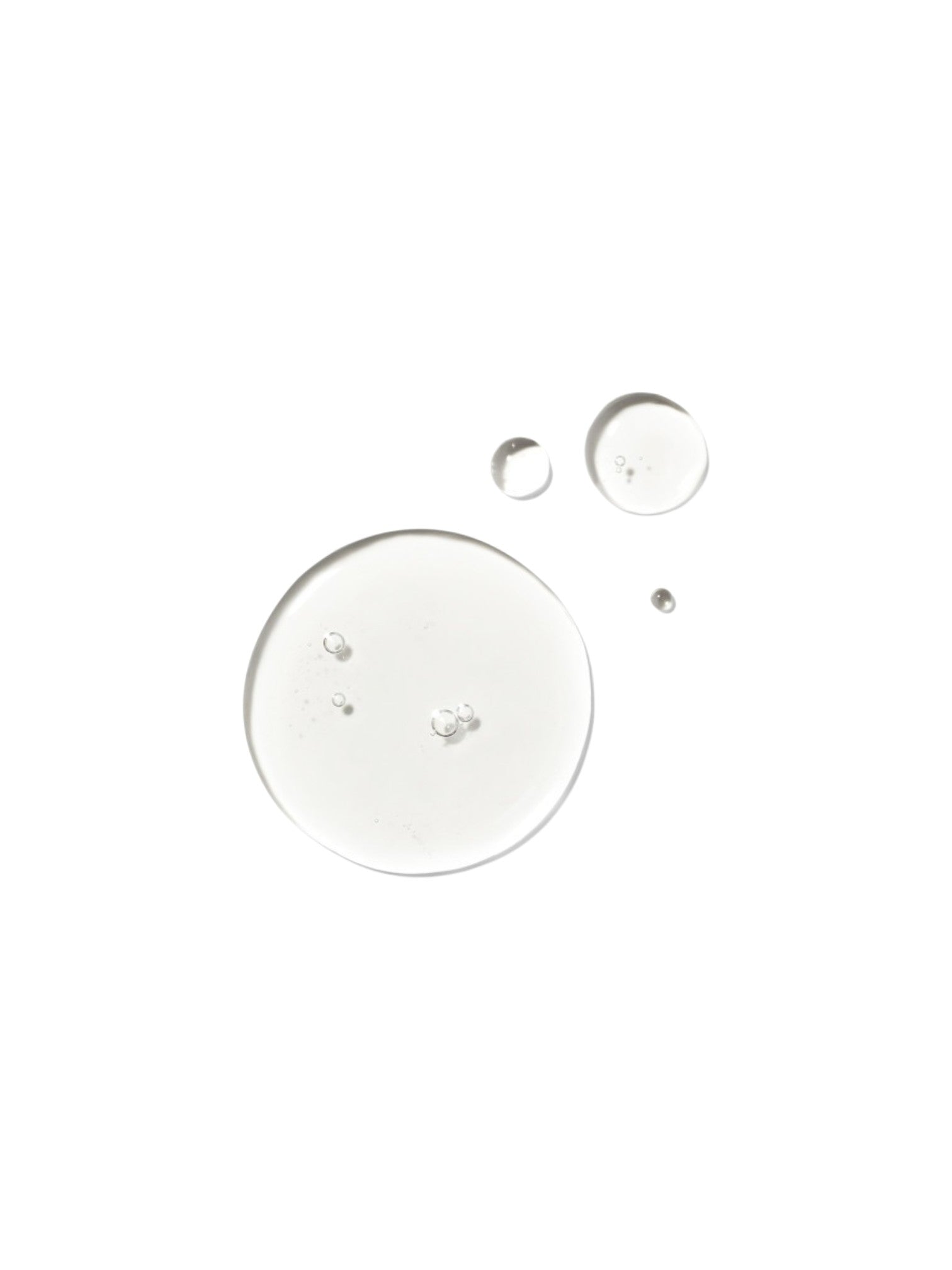 Three circular droplets on a white background. Bobbi Brown, Monza Outlet, Monza Fashion, Shein Outlet