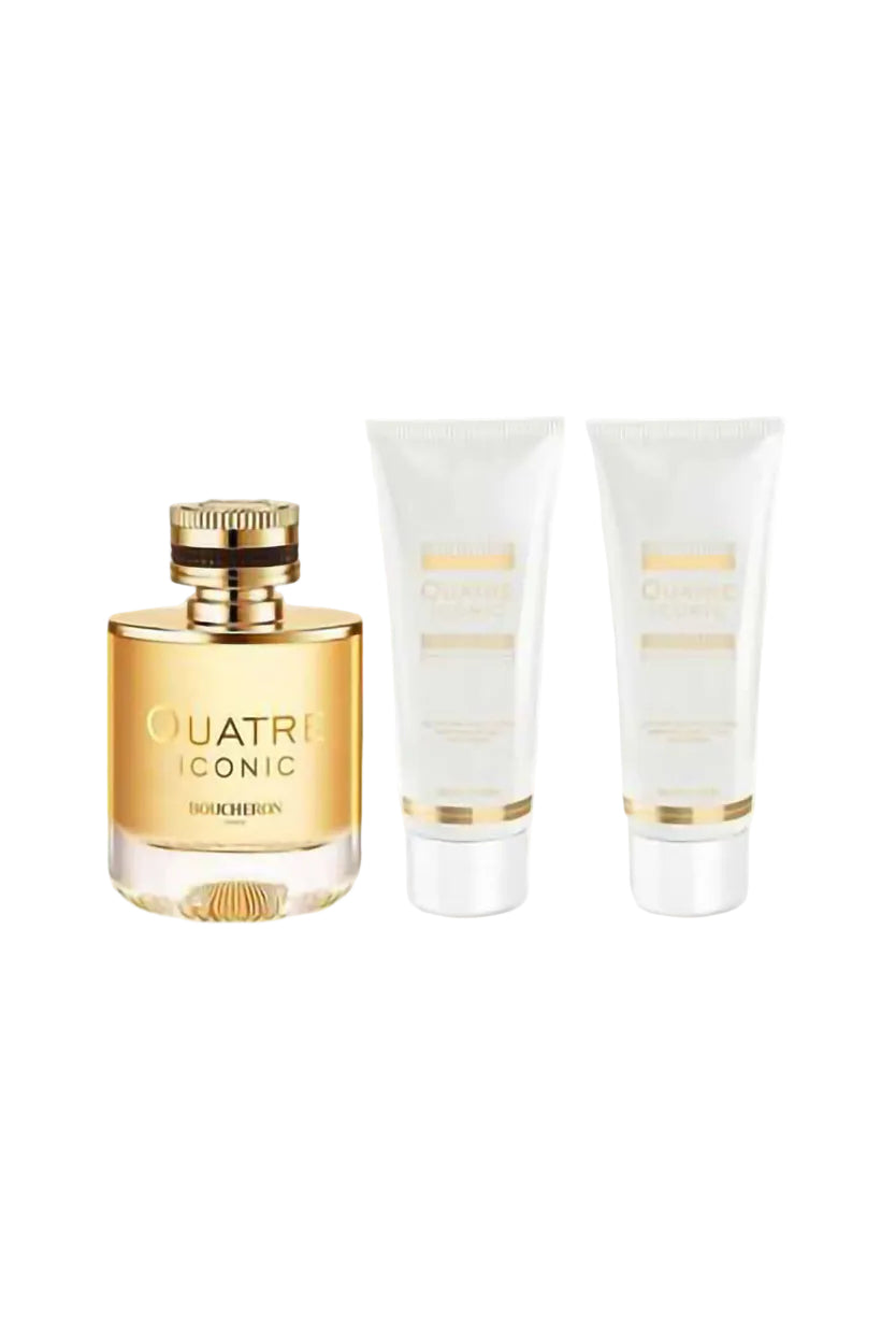 Boucheron Quatre Iconic perfume set with a gold bottle and two white tubes on a white background Monza Outlet