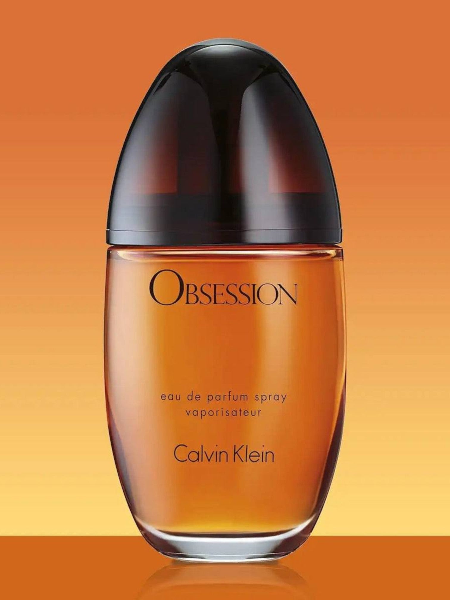 Calvin Klein Obsession perfume bottle on an orange background. Calvin Klein, Monza Outlet, Monza Fashion, Shein Outlet