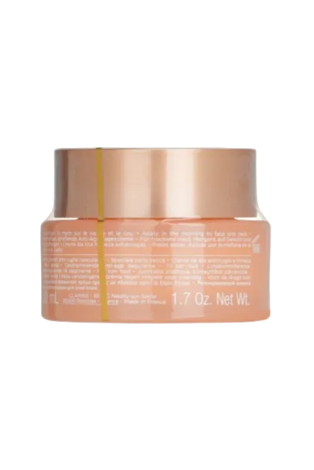 Cosmetic jar with a gold lid on a white background. Clarins, Monza Outlet, Monza Fashion, Shein Outlet