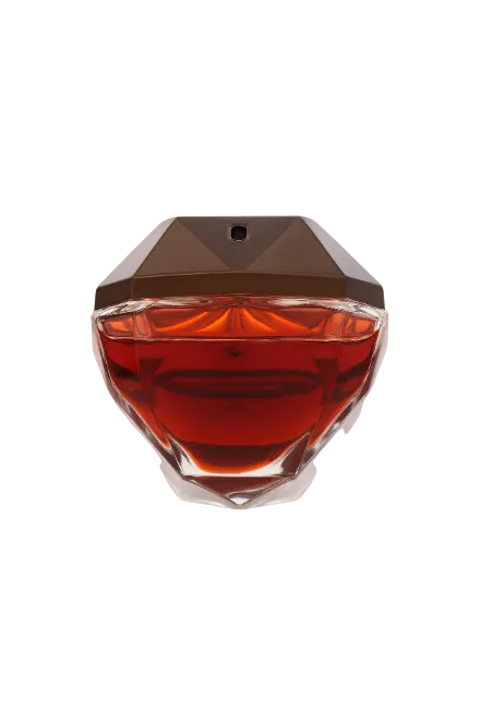 Perfume bottle with brown liquid on a white background Monza Outlet, Monza Fashion, Shein Outlet