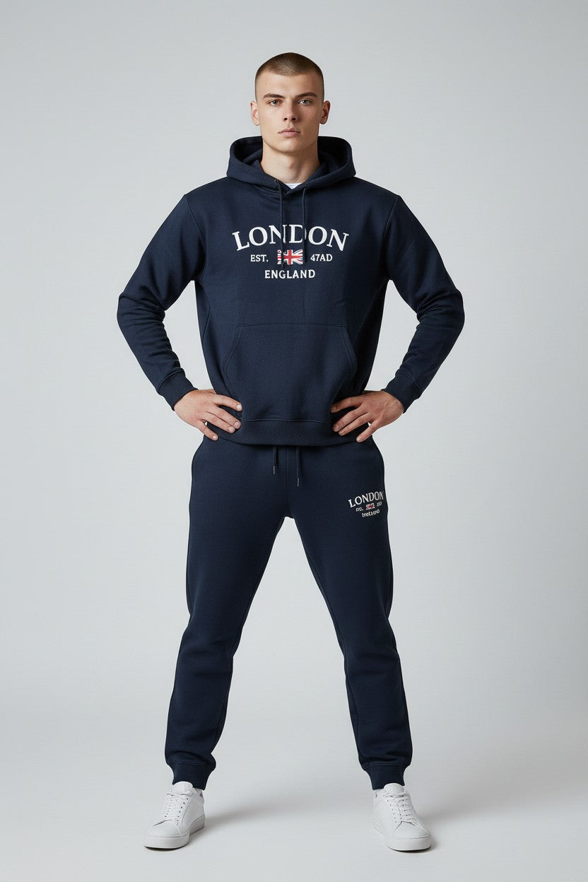 Man wearing a navy hoodie and jogger set with London England text on a white background. Antler, Monza Outlet, Monza Fashion, Shein Outlet