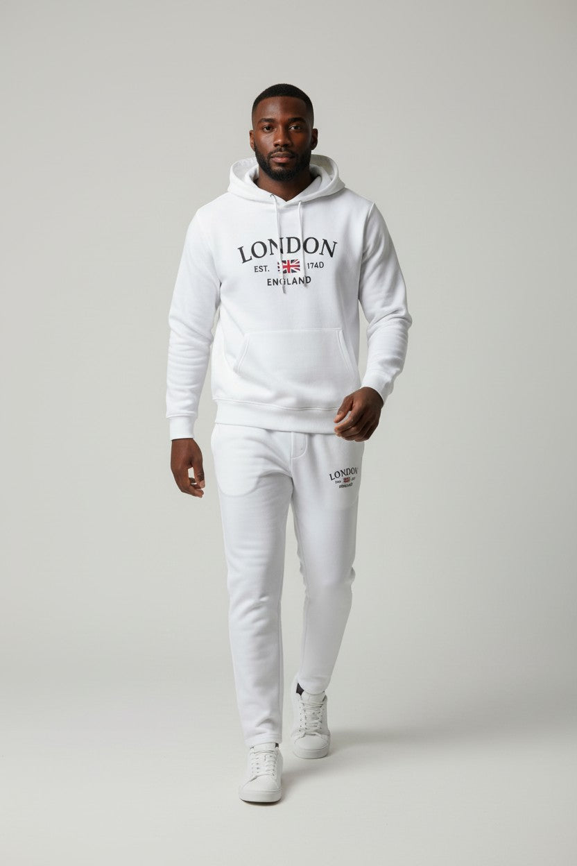 Man wearing a white London hoodie and pants on a gray background. Antler, Monza Outlet, Monza Fashion, Shein Outlet