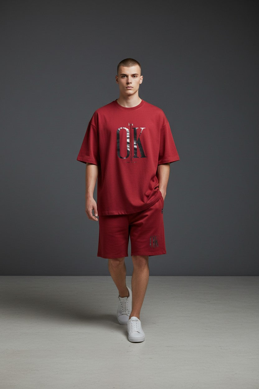 Man wearing a red Calvin Klein outfit on a gray background. Antler, Monza Outlet, Monza Fashion, Shein Outlet