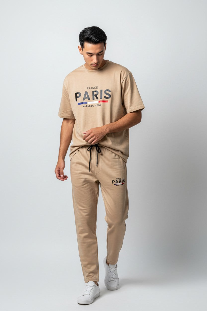 Man wearing a beige Paris t-shirt and pants on a white background. Antler, Monza Outlet, Monza Fashion, Shein Outlet