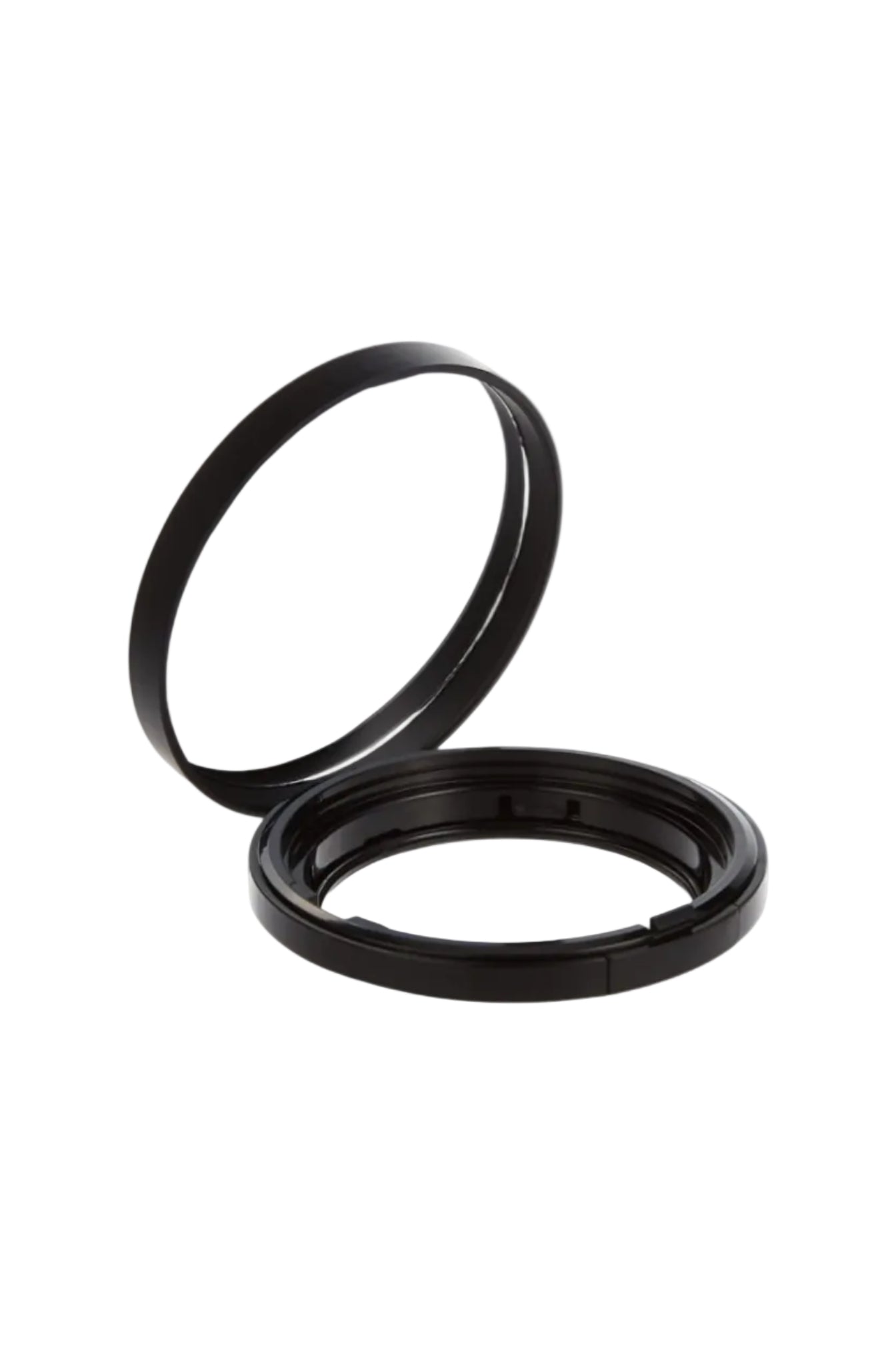 Camera lens filter with black metal frame on a white background. Shiseido, Monza Outlet, Monza Fashion, Shein Outlet 