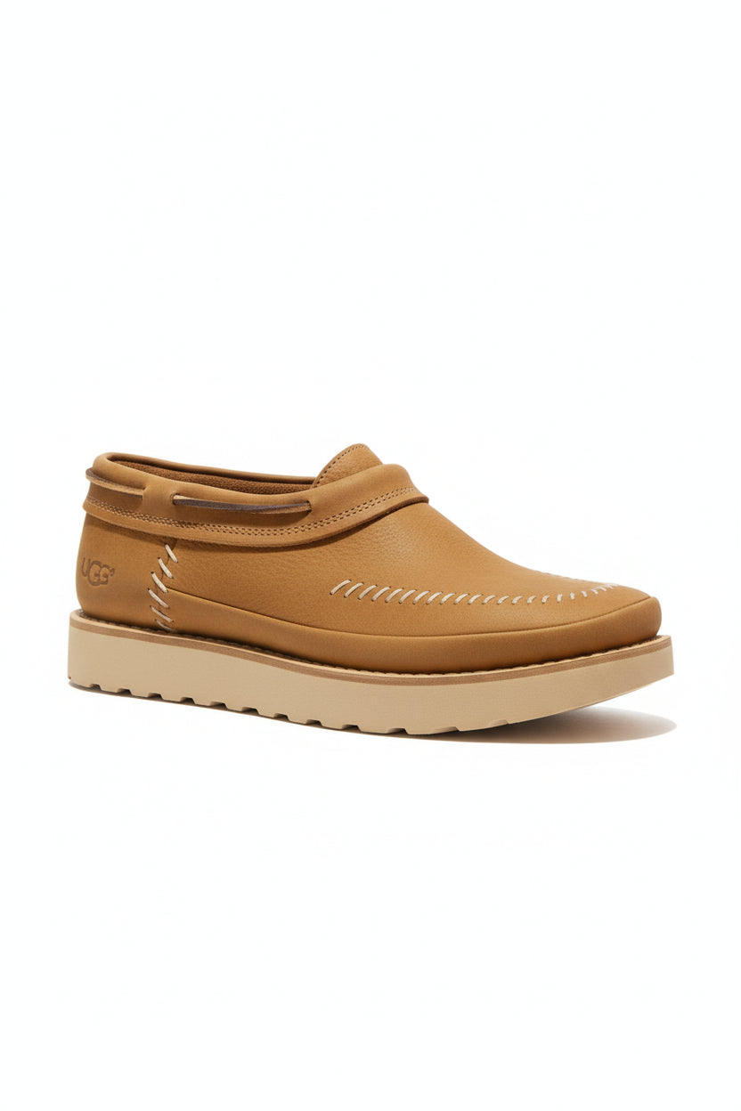 Tan shoe on a white background. UGG, Monza Outlet, Monza Fashion, Shein Outlet