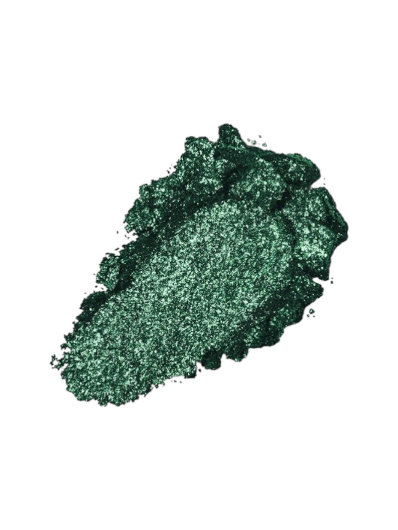 Green glitter powder on a white background. Kiko, Monza Outlet, Monza Fashion, Shein Outlet 