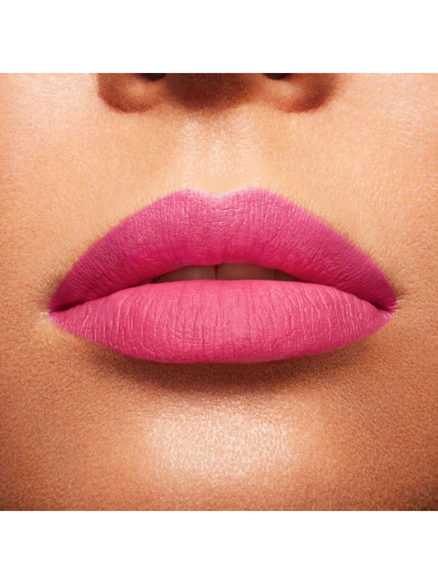 Close-up of a person wearing bright pink lipstick on a neutral background. lancome, Monza Outlet, Monza Fashion, Shein Outlet