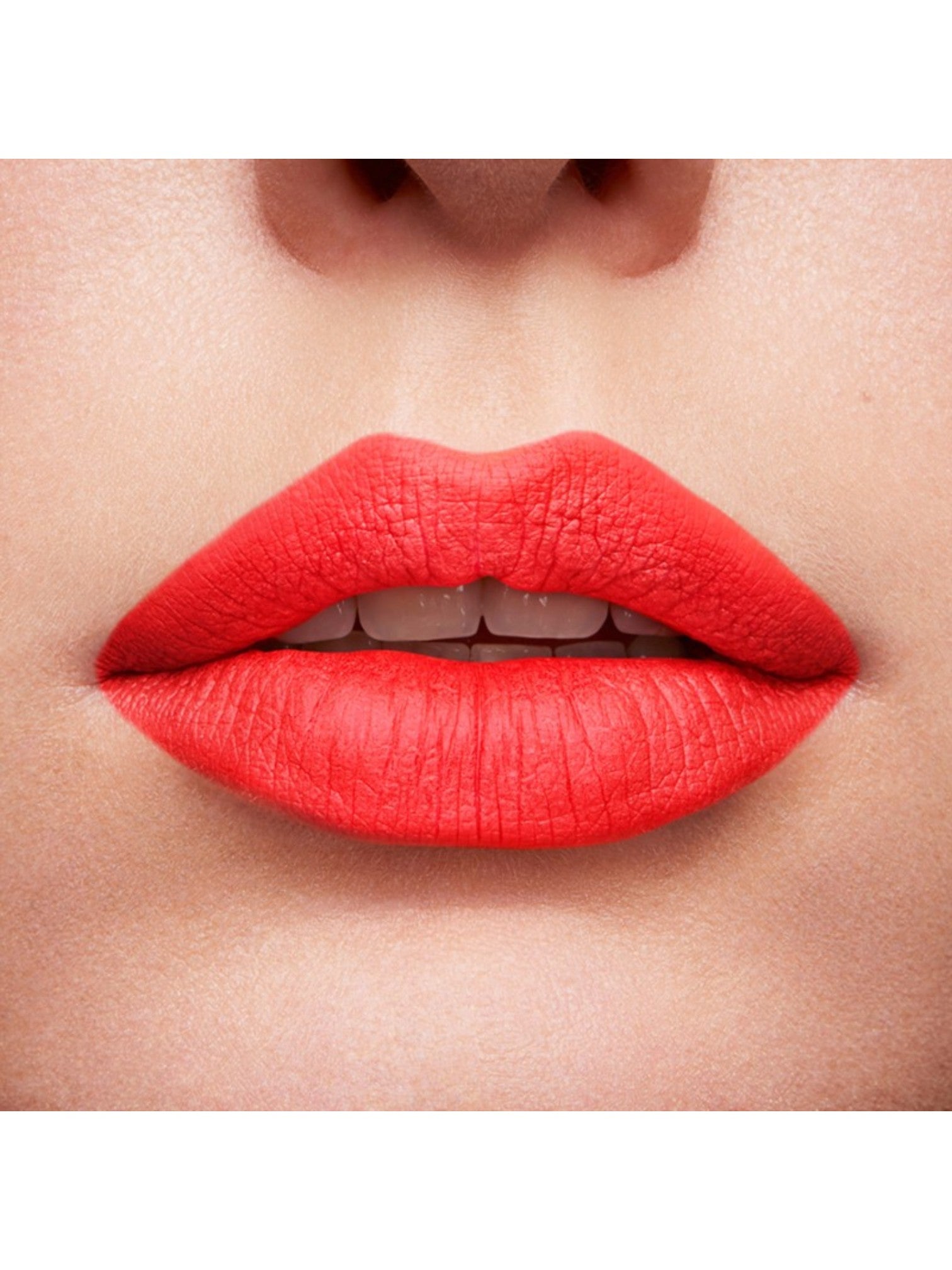 Close-up of red lipstick on lips with a neutral background. lancome, Monza Outlet, Monza Fashion, Shein Outlet