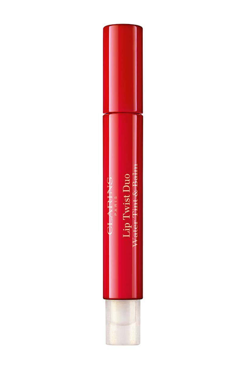 Red lip balm tube on a white background Clarins Monza Outlet 