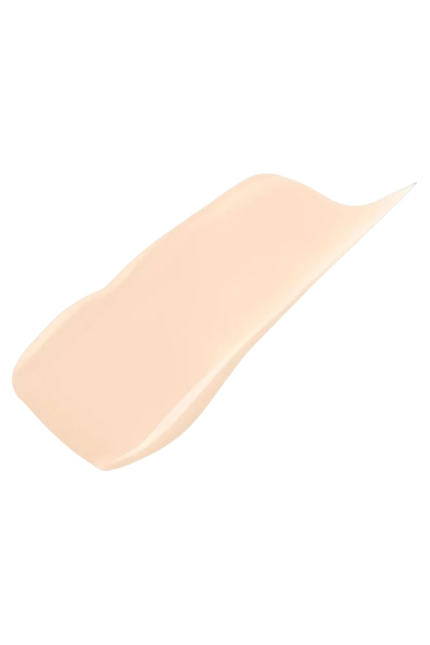 Beige cosmetic product on a white background Monza fashion outlet, monza outlet, shein outlet, shien outlet cosmetics, makeup, perfume