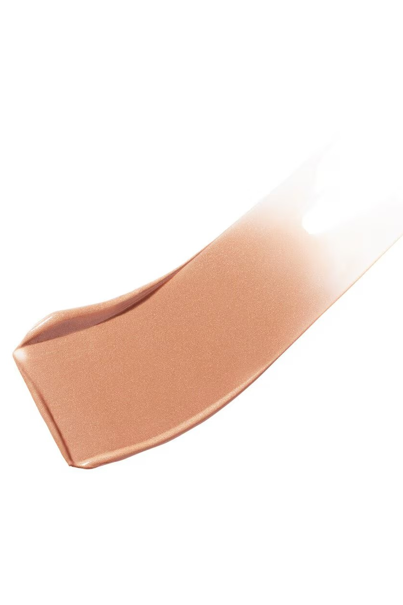 Close-up of a beige makeup product on a white background Monza fashion outlet, monza outlet, shein outlet, shien outlet cosmetics, makeup, perfume