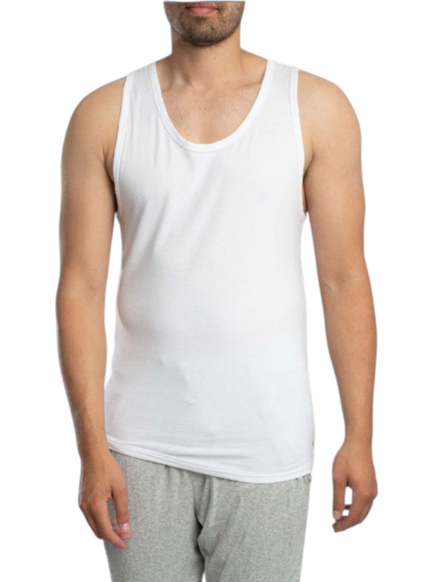 A man wearing a plain white sleeveless tank top and light gray sweatpants, shown from the lower face to the upper thighs against a light gray studio background. Calvin Klein, Monza Outlet, Monza Fashion, Shein Outlet