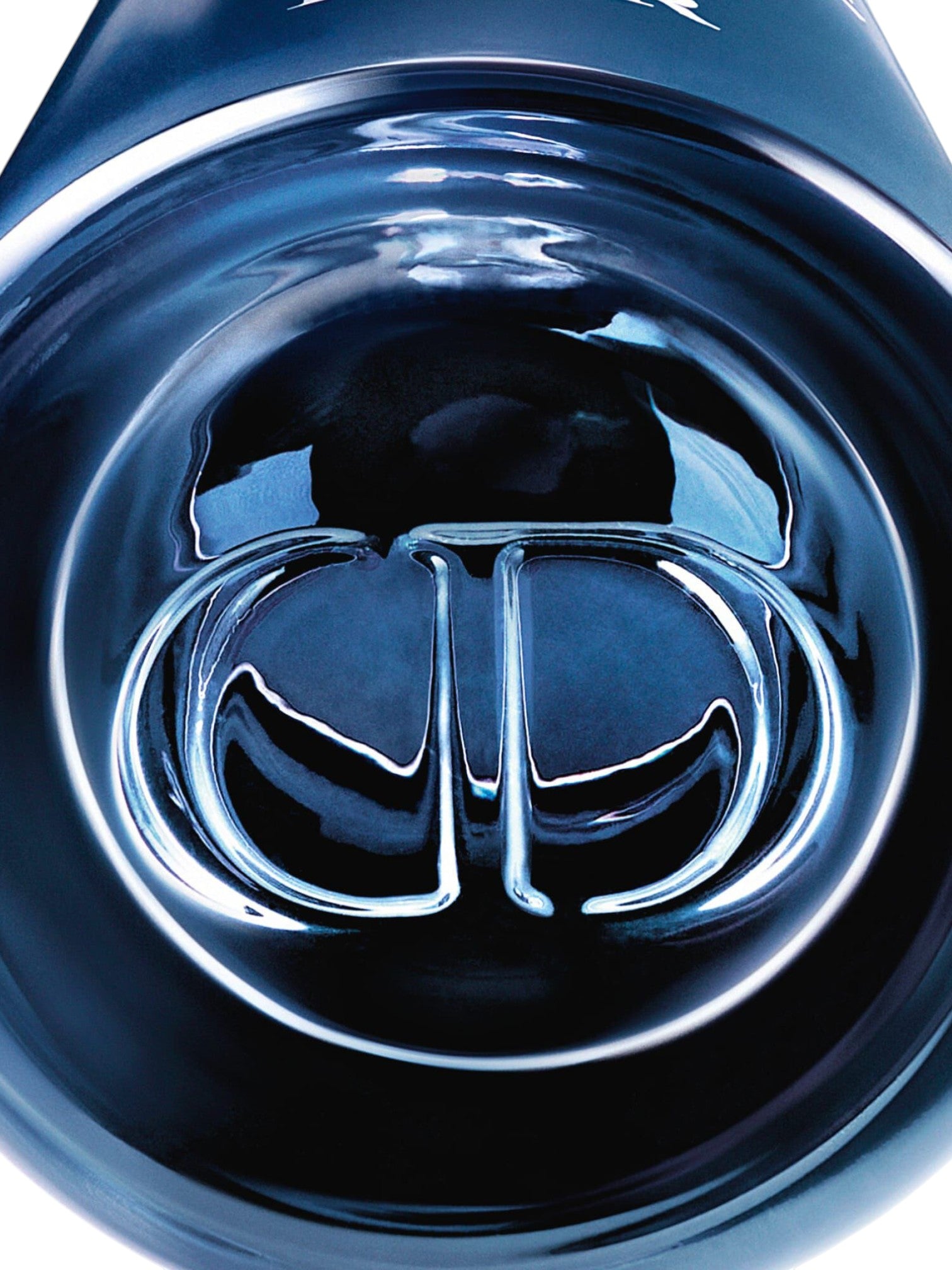 Close-up of a reflective logo on a dark background, Christian Dior, Monza Outlet, Monza Fashion, Shein Outlet