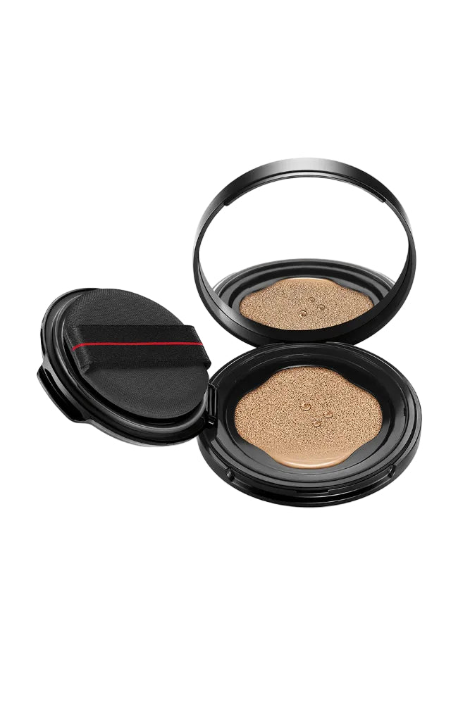 Two open black compact cases with beige powder on a white background Monza fashion outlet, monza outlet, shein outlet, shien outlet cosmetics, makeup, perfume