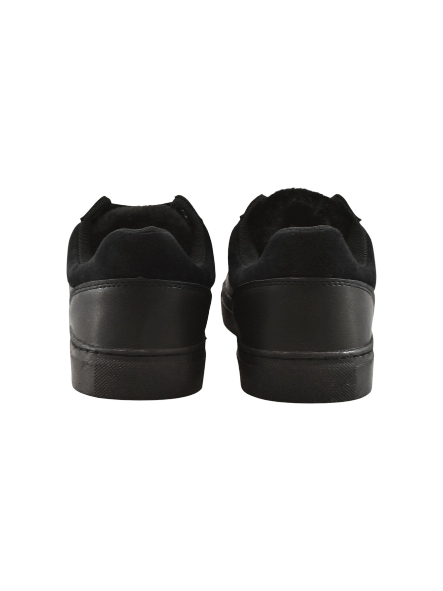 Black sneakers on a white background.  United Colors of Benetton, Monza Outlet, Monza Fashion, Shein Outlet 