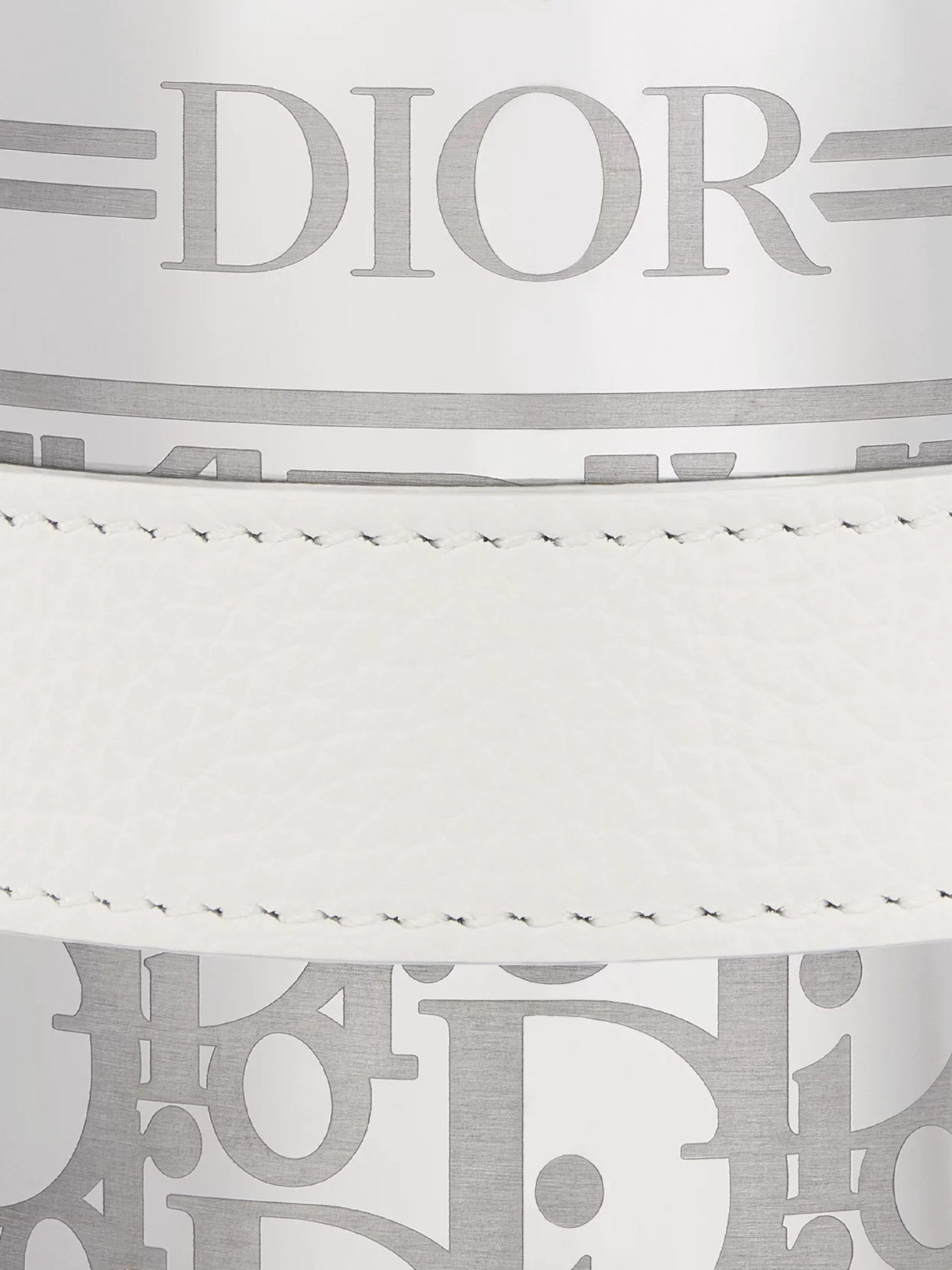 Close-up of a white Dior handbag with brand logo. Dior, Monza Outlet, Monza Fashion, Shein Outlet