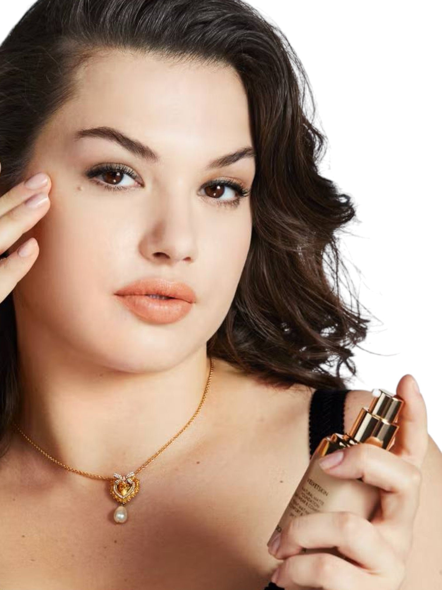 Woman applying skincare product with a focus on her face Dolce Gabbana Monza Outlet